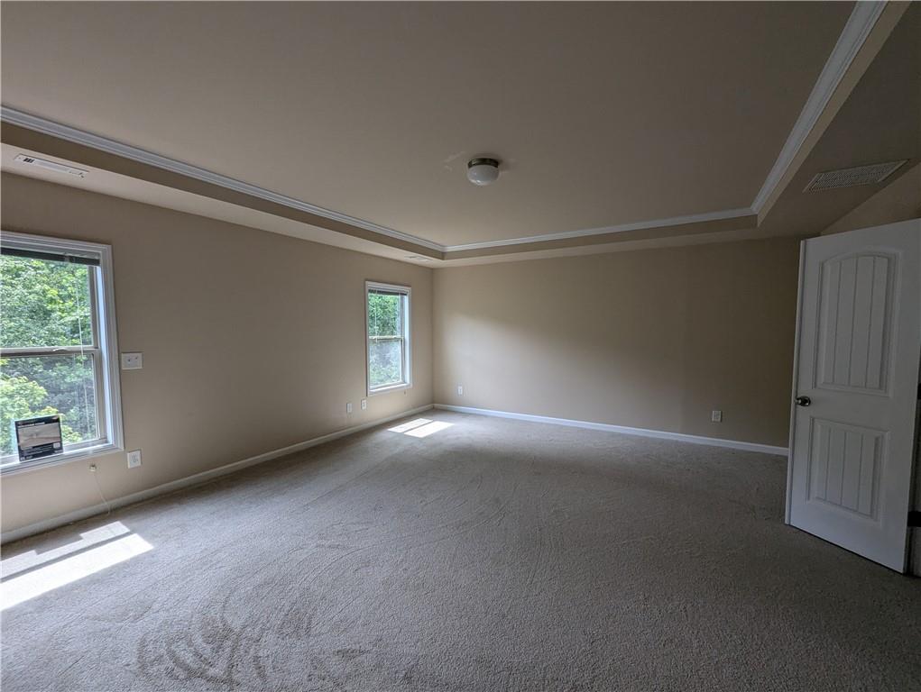355 Fowler Springs Court Alpharetta, GA 30004 - Photo 6 of 16 an empty room with windows and closet