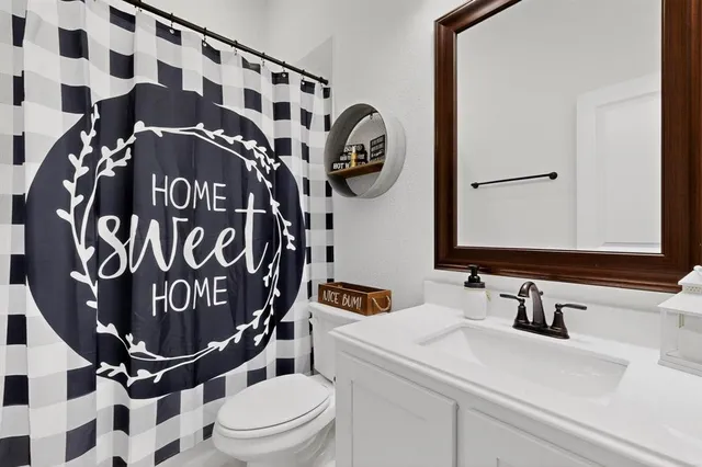 a bathroom with a bathtub and a sink