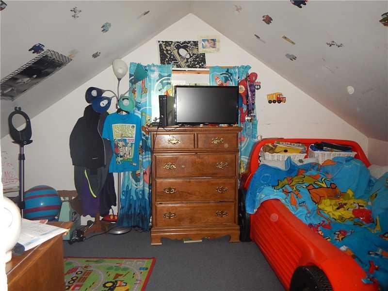1520 Edgewood Road Beaver Falls, PA 15010 - Photo 12 of 17 Bedroom. The third bedroom is located on the upper floor.