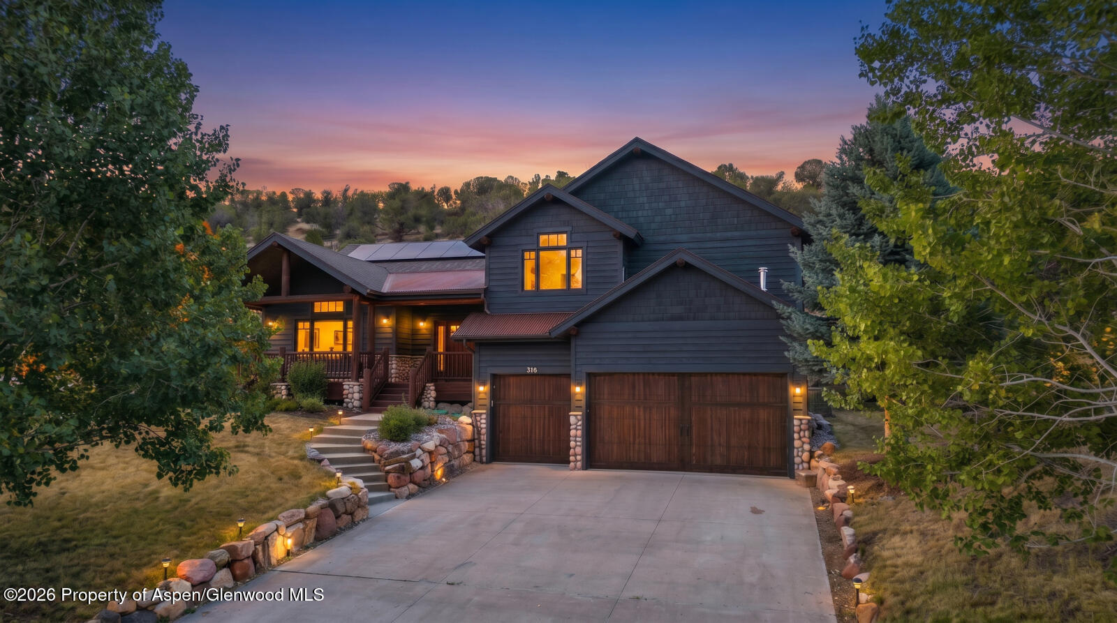 316 Faas Ranch Road New Castle, CO 81647 - Photo 1 of 50 a front view of a house with a yard