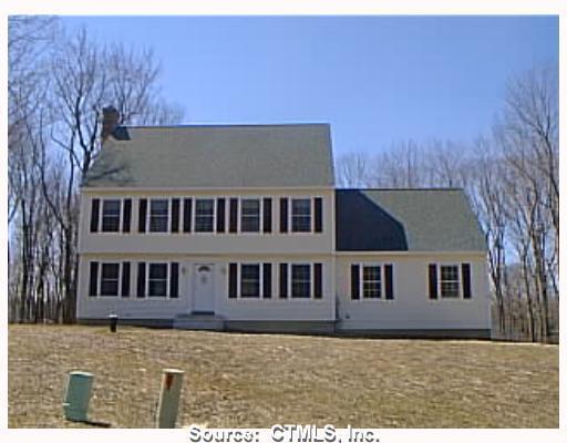 front view of house with a yard