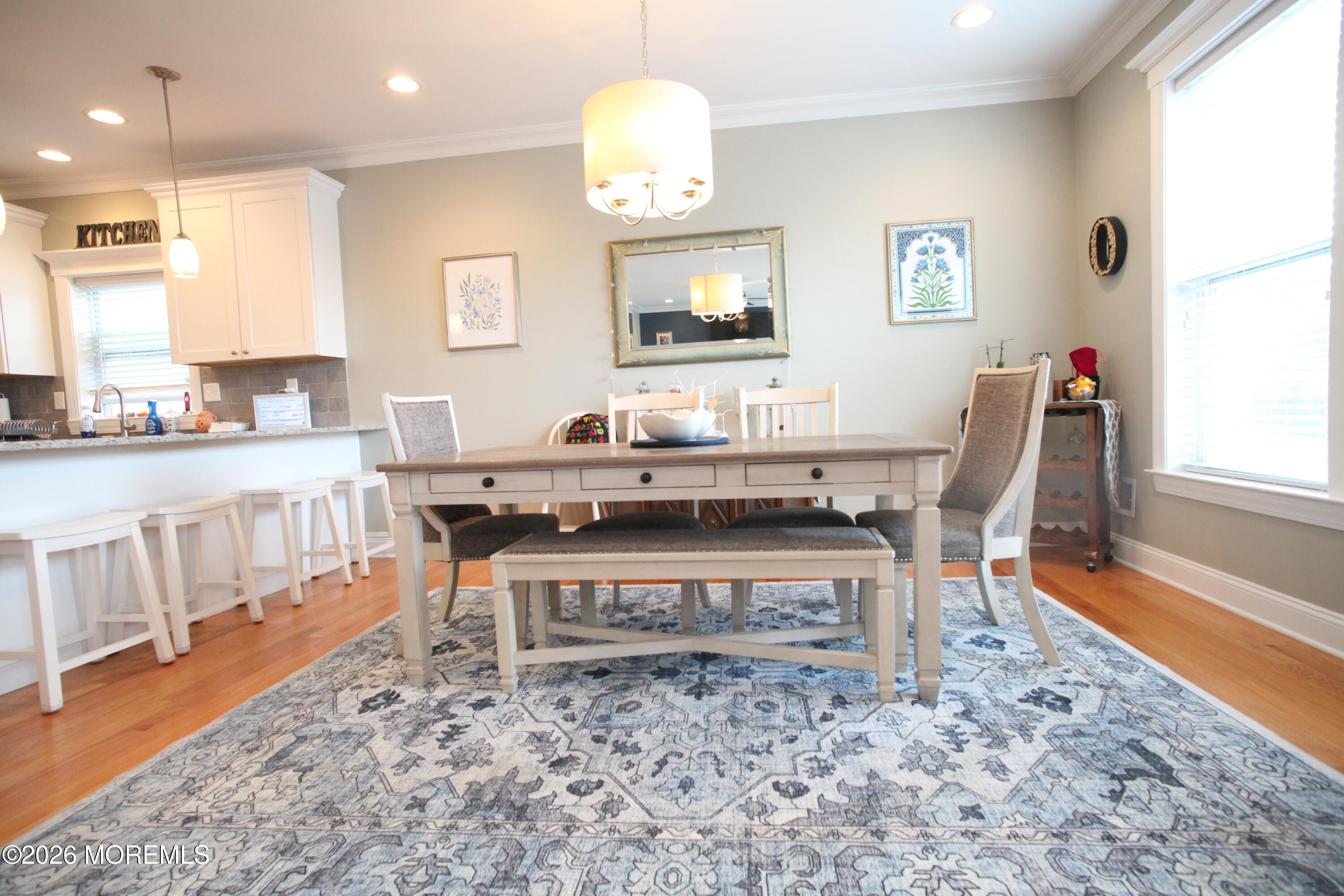 107 Waldron Road Toms River, NJ 08753 - Photo 5 of 20 a dining room with wooden floor and a window
