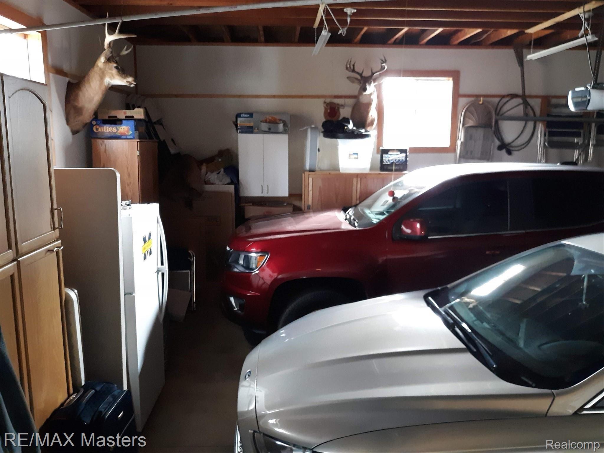 3268 Heiss Road Monroe, MI 48162 - Photo 14 of 20 Attached Oversize two car garage with great windows (high up!!), auto door opener and finished walls