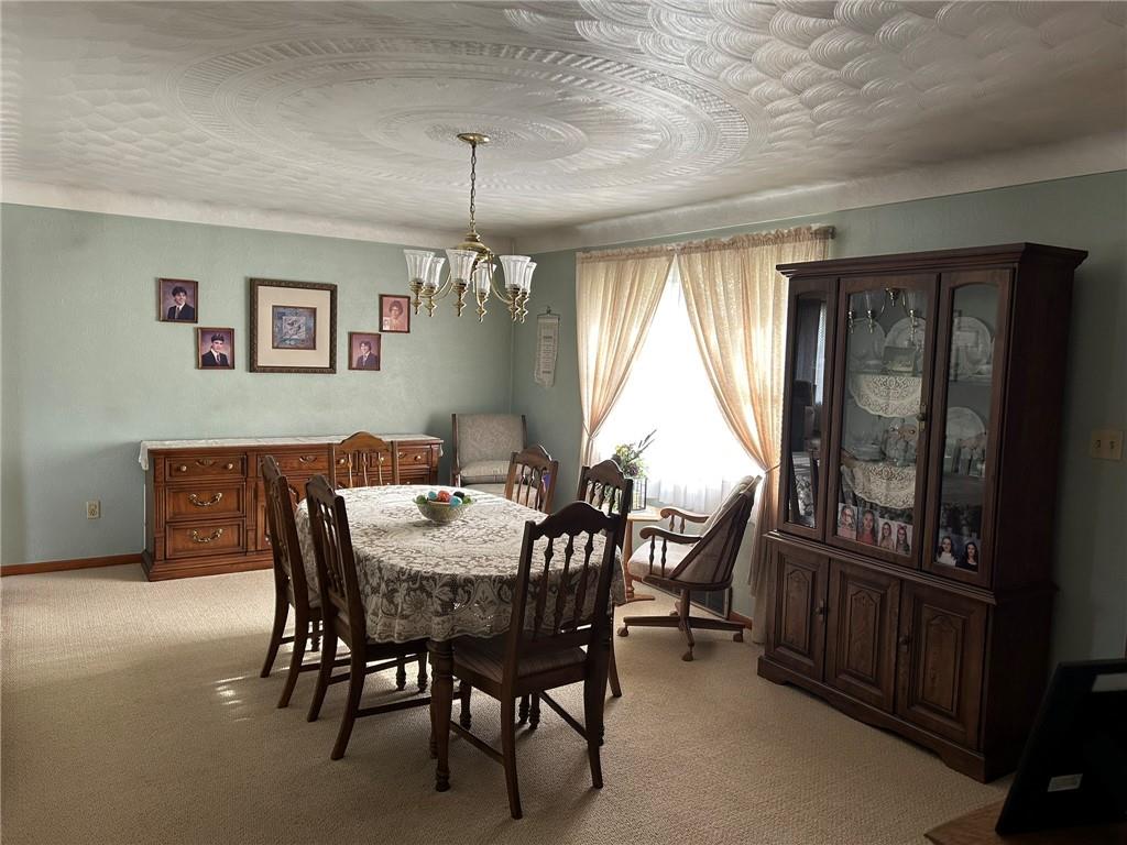 356 3rd Street Smithton, PA 15479 - Photo 6 of 15 a dining room with furniture and window