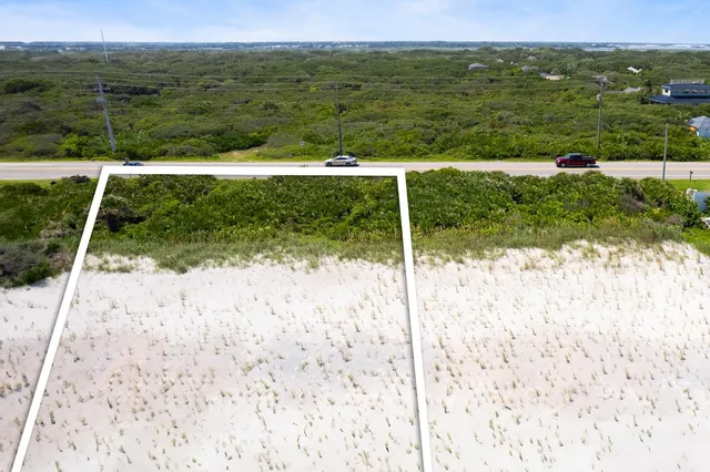 a view of a lake with a yard