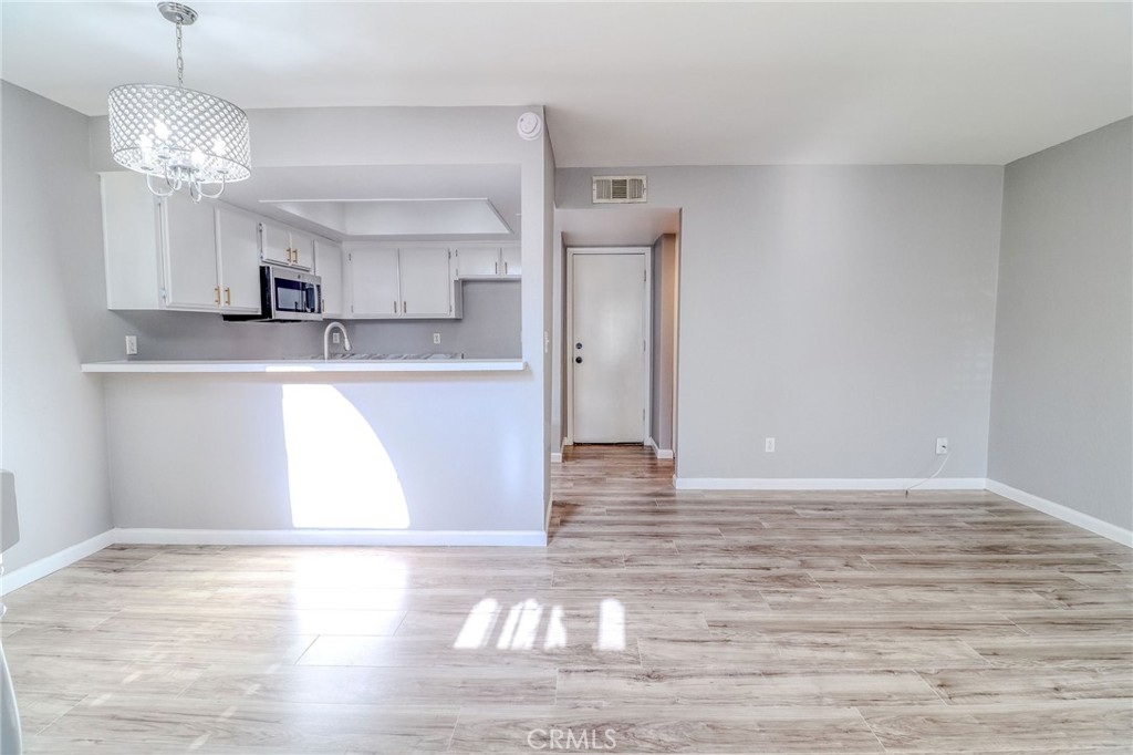14738 Pioneer Boulevard Norwalk, CA 90650 - Photo 38 of 72 a view of a kitchen with sink and microwave