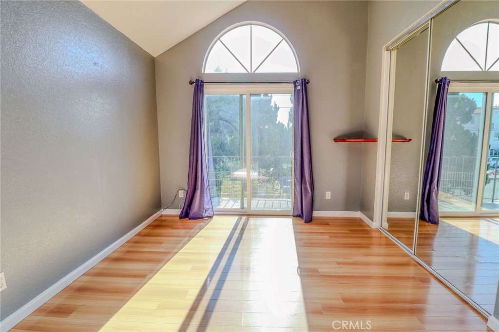 14738 Pioneer Boulevard Norwalk, CA 90650 - Photo 57 of 72 a bedroom with a bed and a large window