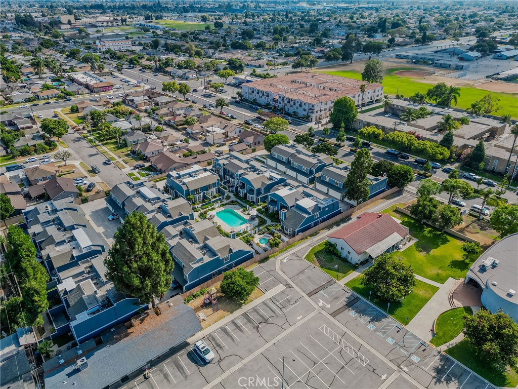 14738 Pioneer Boulevard Norwalk, CA 90650 - Photo 10 of 72 an aerial view of a house with a swimming pool yard and outdoor seating