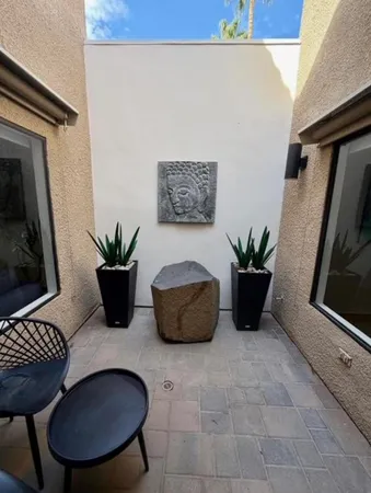 a view of a livingroom with furniture and a couch