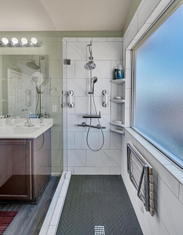 9836 Shallow Creek Drive Waco, TX 76708 - Photo 22 of 32 a bathroom with a double vanity sink mirror and shower