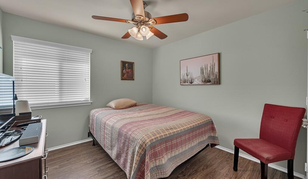 9836 Shallow Creek Drive Waco, TX 76708 - Photo 23 of 32 a bedroom with a bed and chair