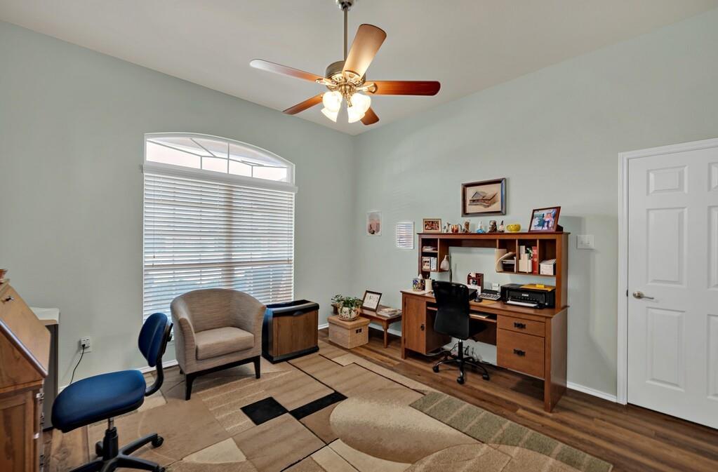 9836 Shallow Creek Drive Waco, TX 76708 - Photo 25 of 32 a living room with furniture a piano and a window