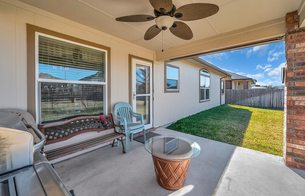 9836 Shallow Creek Drive Waco, TX 76708 - Photo 27 of 32 a balcony with furniture and a yard