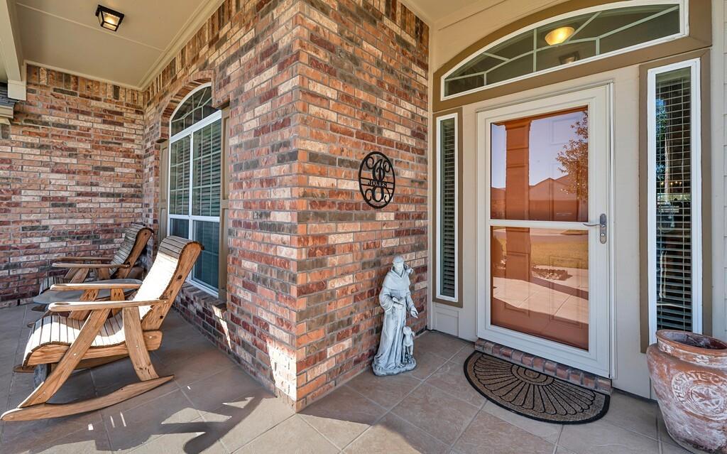 9836 Shallow Creek Drive Waco, TX 76708 - Photo 3 of 32 a balcony with table and chairs