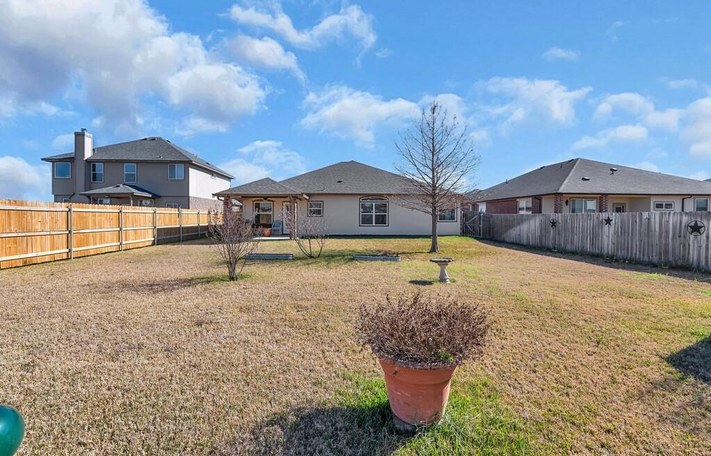 9836 Shallow Creek Drive Waco, TX 76708 - Photo 31 of 32 a view of a house with a yard