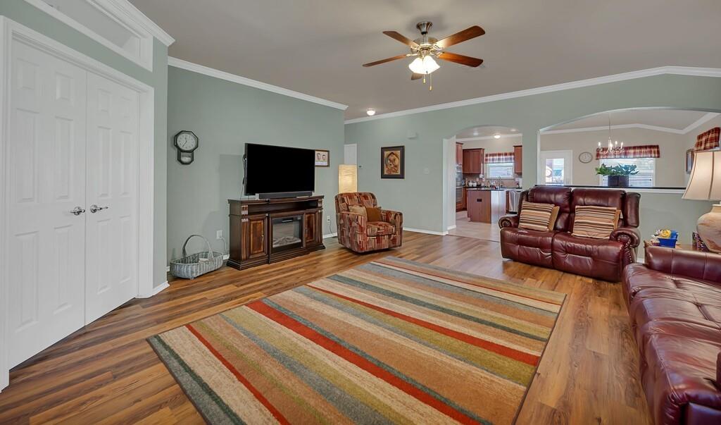 9836 Shallow Creek Drive Waco, TX 76708 - Photo 5 of 32 a bedroom with furniture and a flat screen tv
