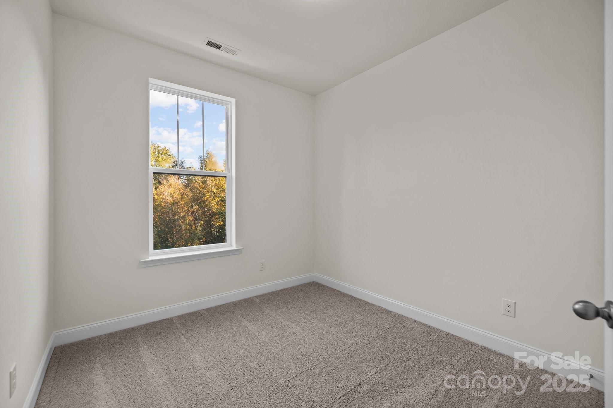 657 District Court Fort Mill, SC 29708 - Photo 29 of 32 an empty room with windows