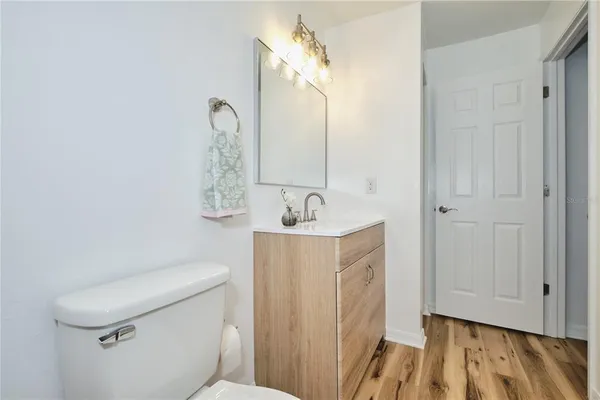 a view of a storage & utility room with closet window