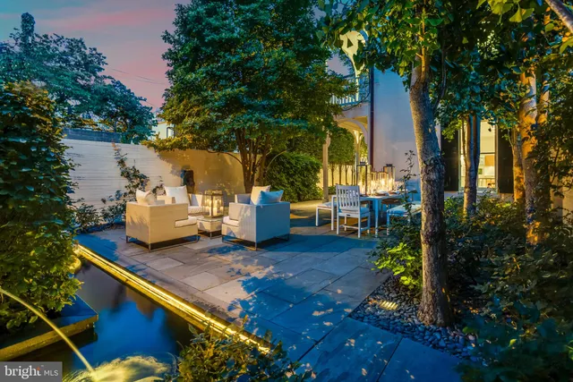 a view of a chairs and table in the patio