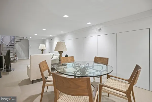 a dining room with furniture and a table