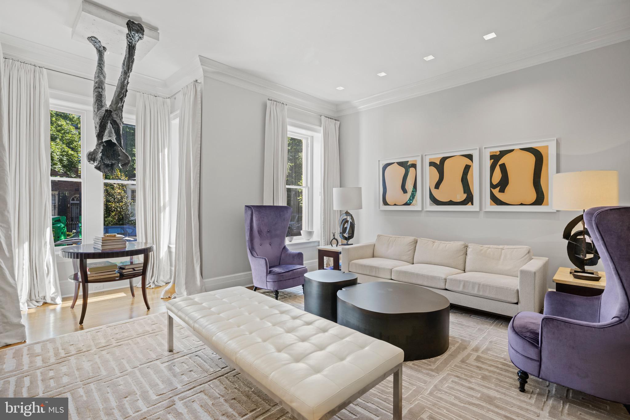 3313 O Street Northwest Washington, DC 20007 - Photo 4 of 31 a living room with furniture and a table