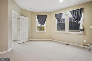 337 Main Street Gaithersburg, MD 20878 - Photo 18 of 35 an empty room with windows