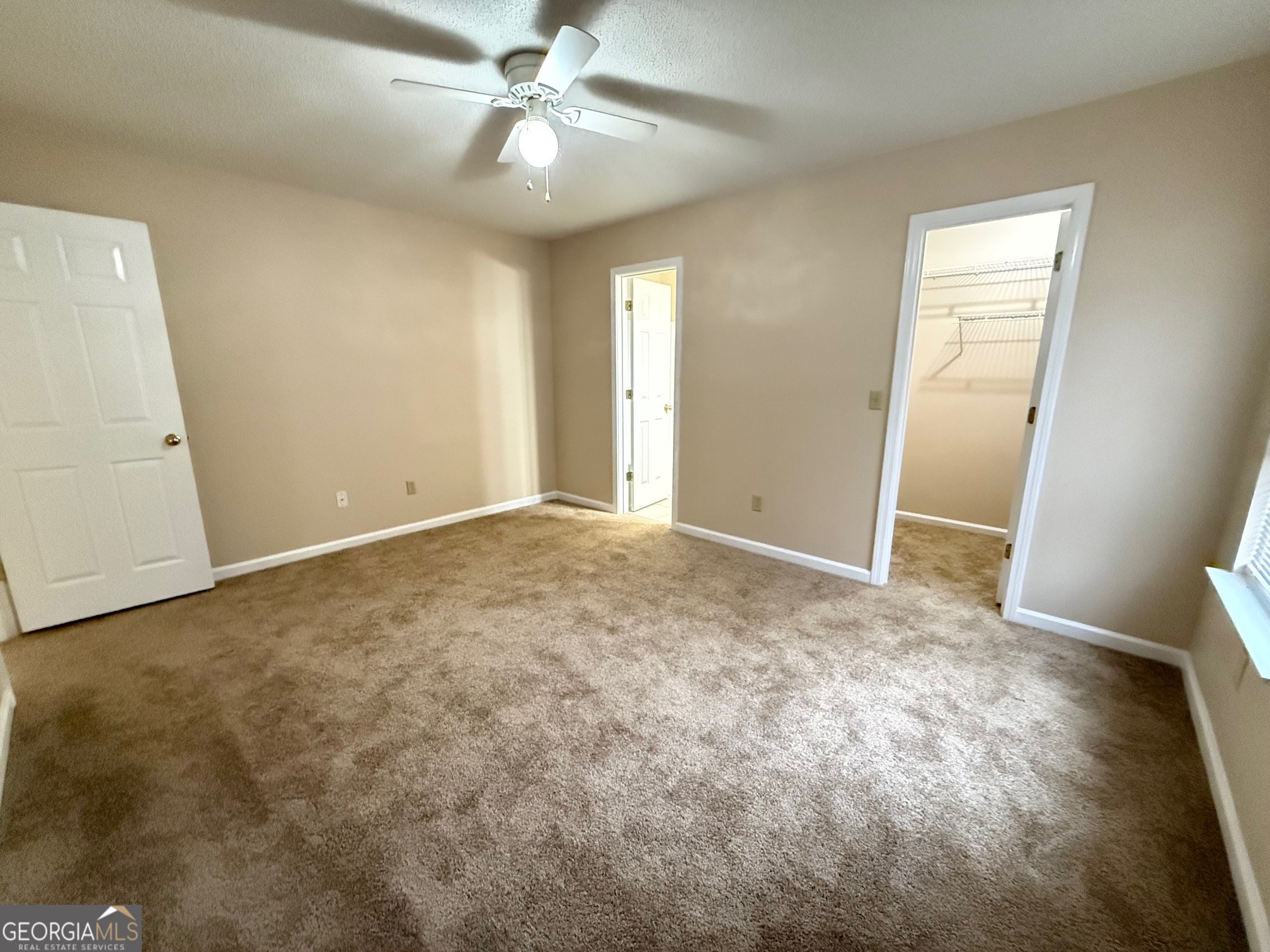 504 Woodbridge Road Kingsland, GA 31548 - Photo 11 of 23 a view of an empty room and chandelier fan