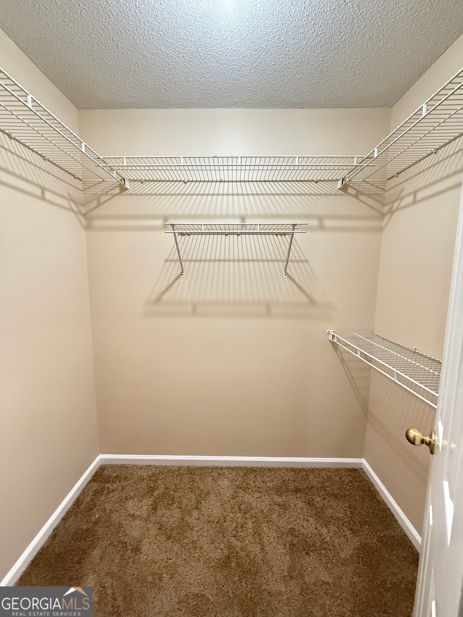 504 Woodbridge Road Kingsland, GA 31548 - Photo 12 of 23 a view of a room with racks on the wall