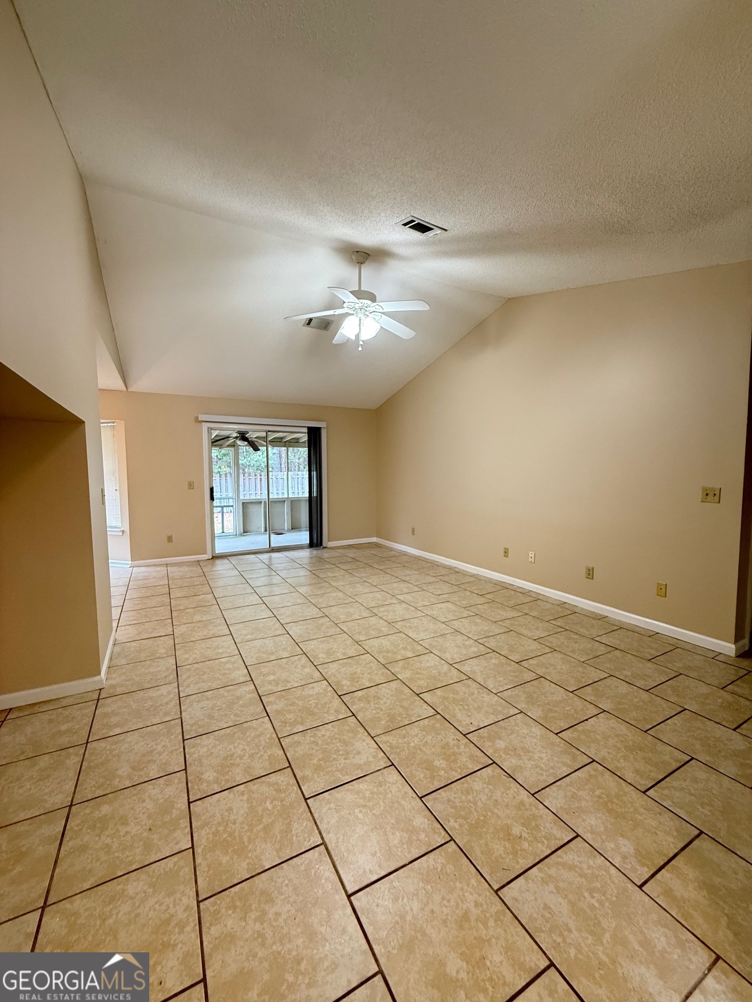 504 Woodbridge Road Kingsland, GA 31548 - Photo 2 of 23 a view of an empty room and window
