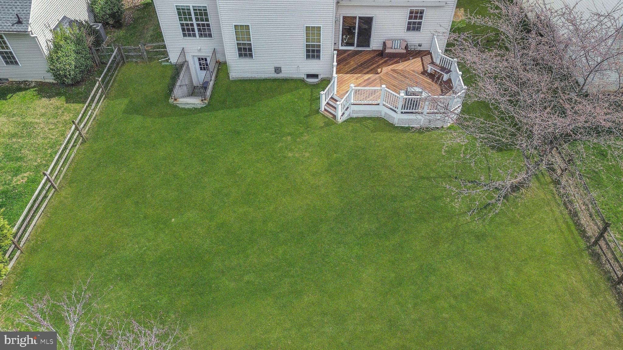 9044 Clendenin Way Frederick, MD 21704 - Photo 2 of 50 a view of a house with a backyard