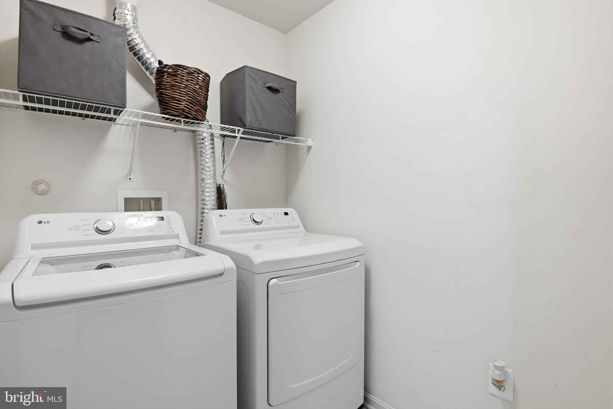 9044 Clendenin Way Frederick, MD 21704 - Photo 21 of 50 a utility room with dryer and washer
