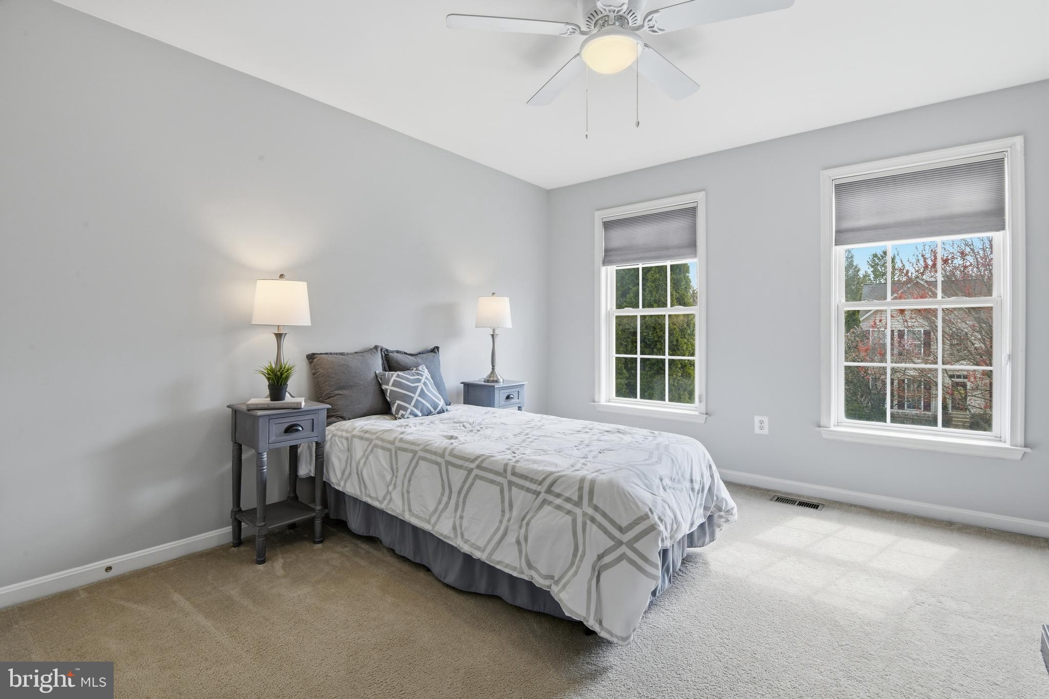 9044 Clendenin Way Frederick, MD 21704 - Photo 24 of 50 a bedroom with a bed and a window