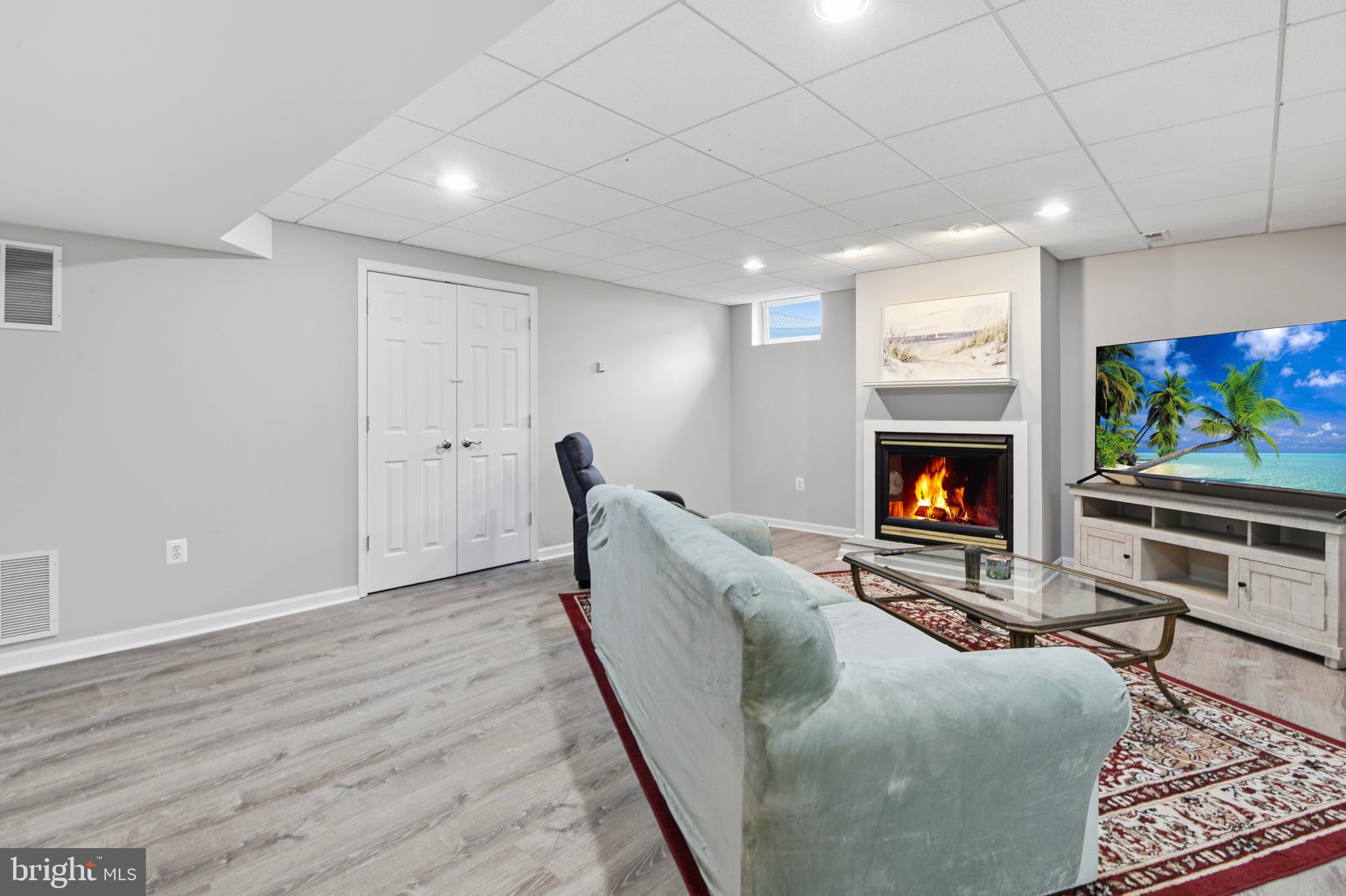 9044 Clendenin Way Frederick, MD 21704 - Photo 28 of 50 a living room with furniture and a flat screen tv