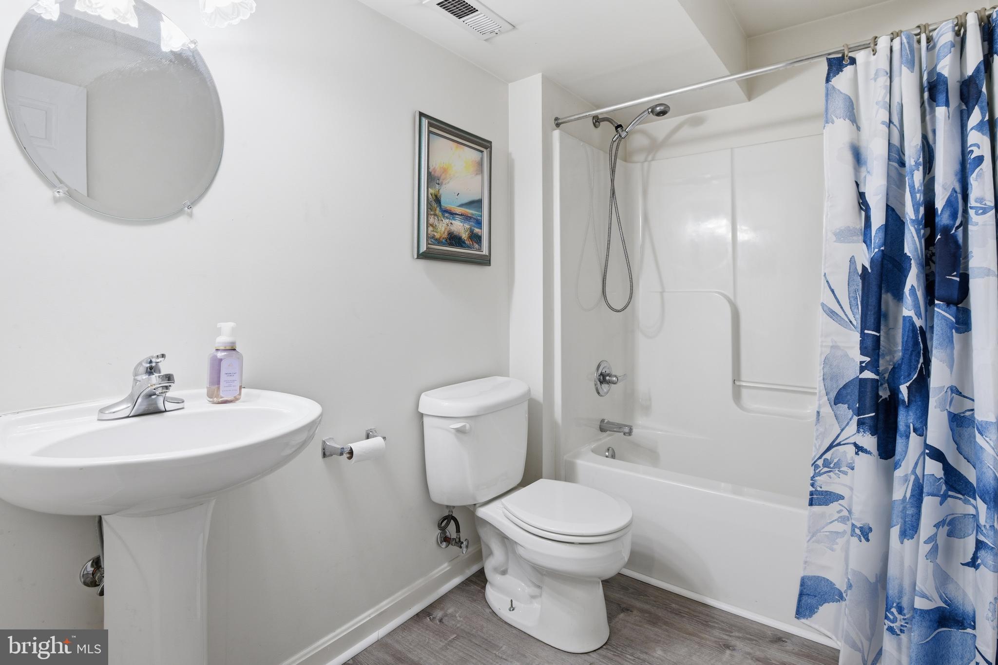 9044 Clendenin Way Frederick, MD 21704 - Photo 30 of 50 a bathroom with a sink toilet and shower