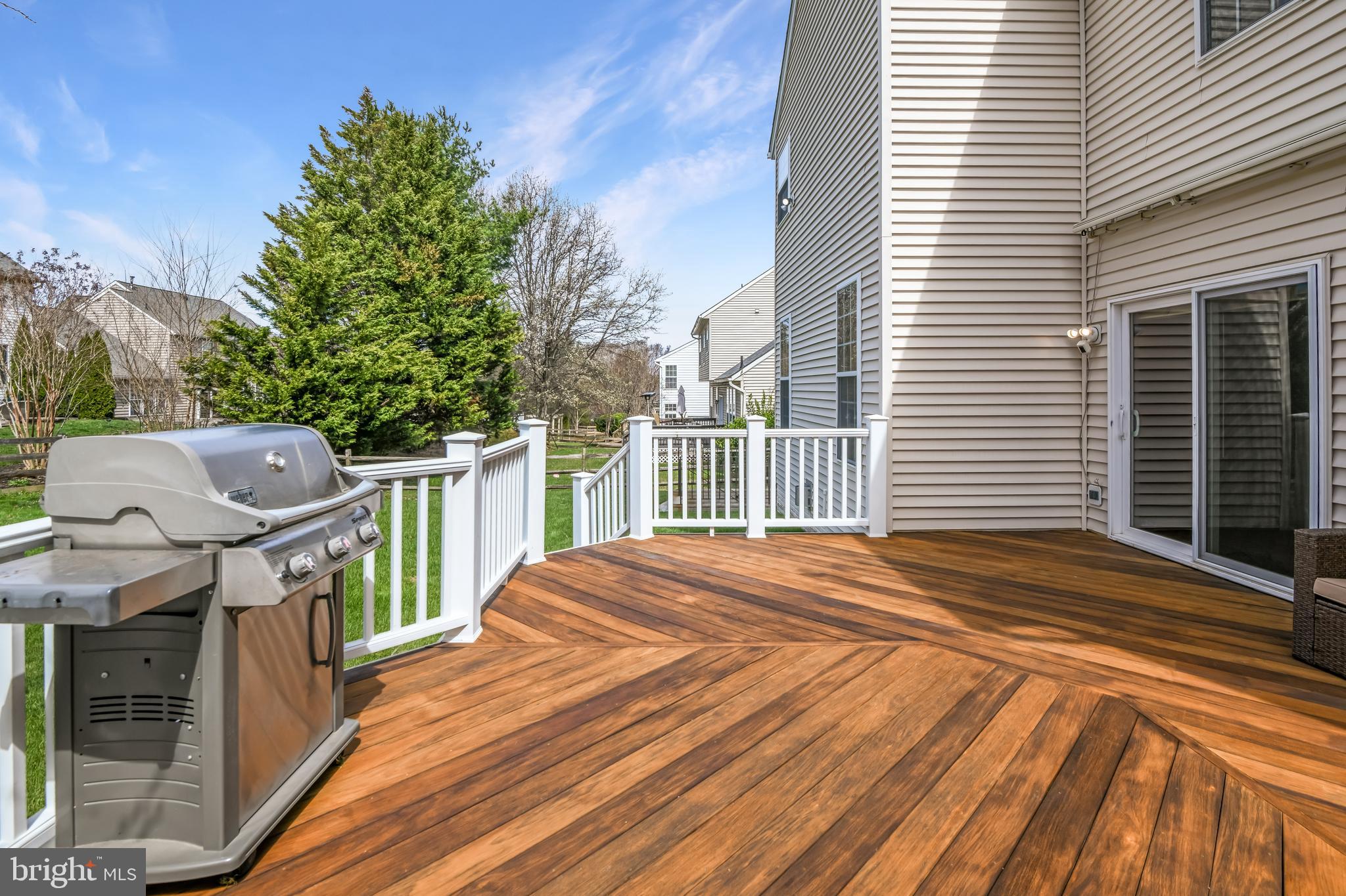 9044 Clendenin Way Frederick, MD 21704 - Photo 32 of 50 a view of a deck with wooden floor and fence