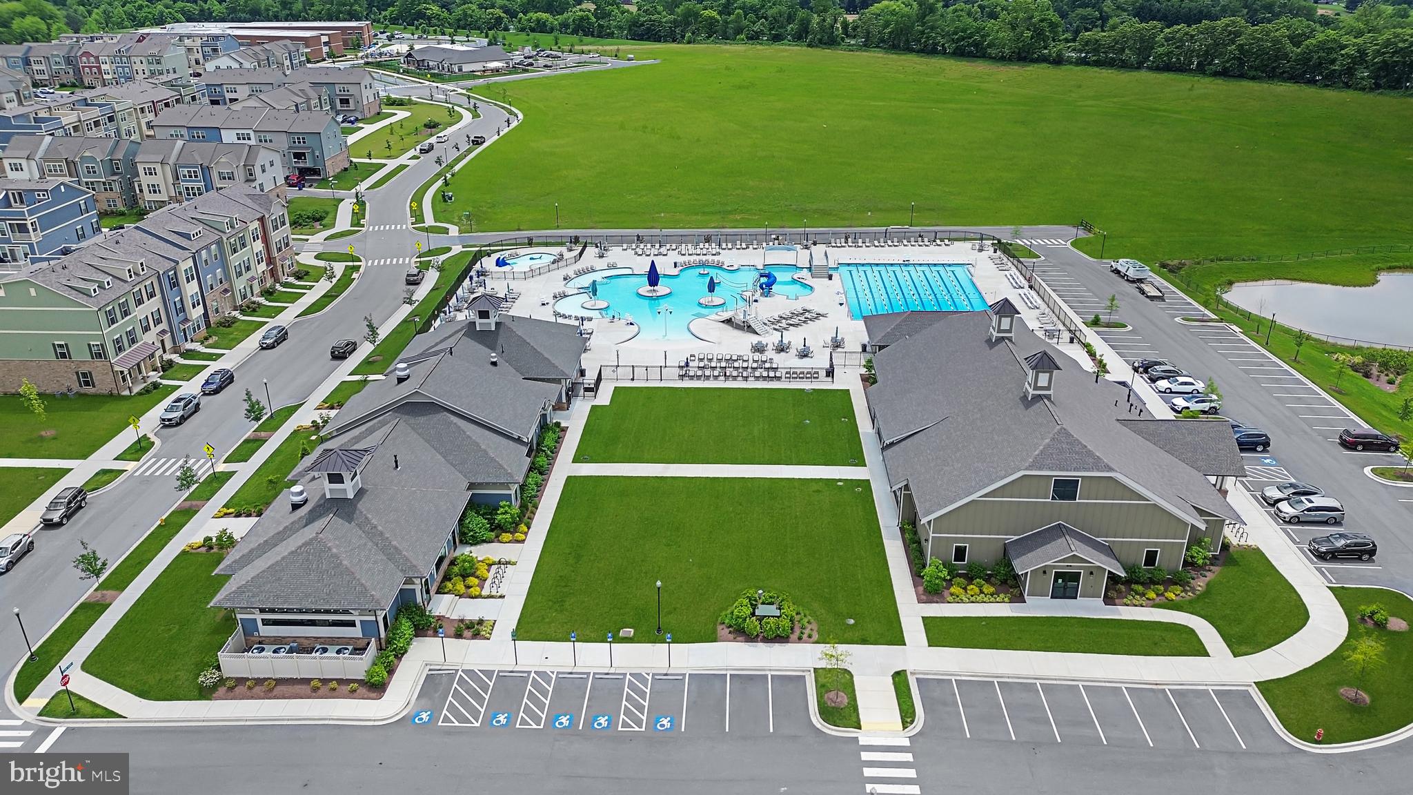 9044 Clendenin Way Frederick, MD 21704 - Photo 41 of 50 an aerial view of a tennis ground and a cars park