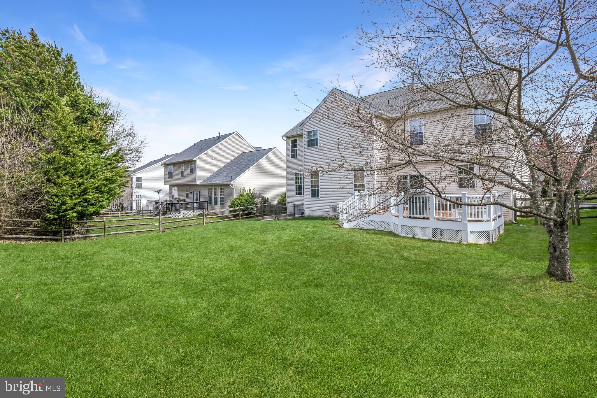 9044 Clendenin Way Frederick, MD 21704 - Photo 10 of 50 a view of a house with a yard