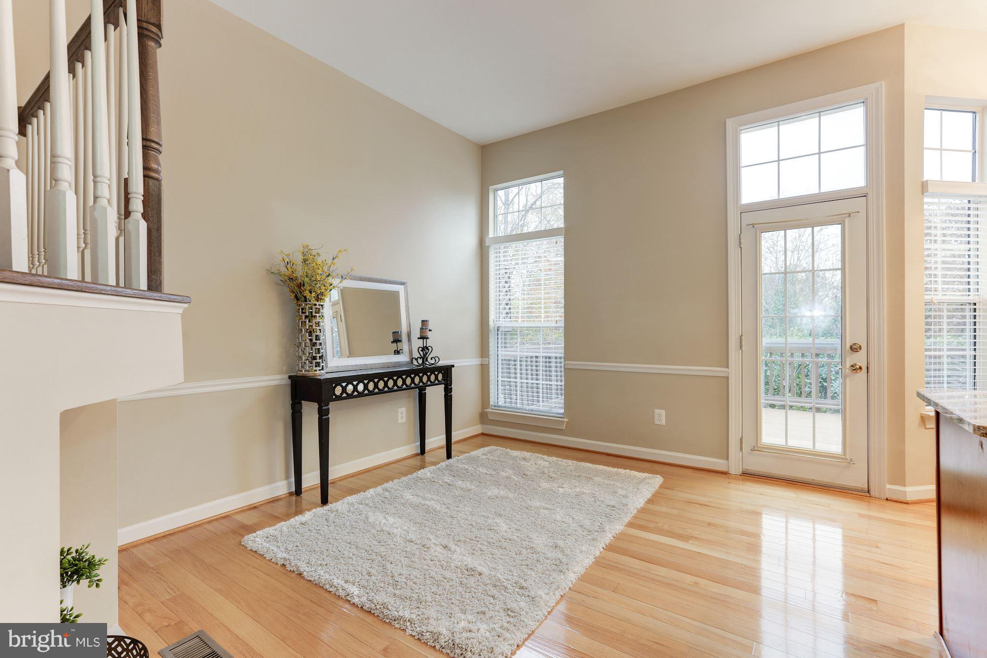 47692 Woolcott Square Sterling, VA 20165 - Photo 14 of 30 Family Room leading to deck and stunning views
