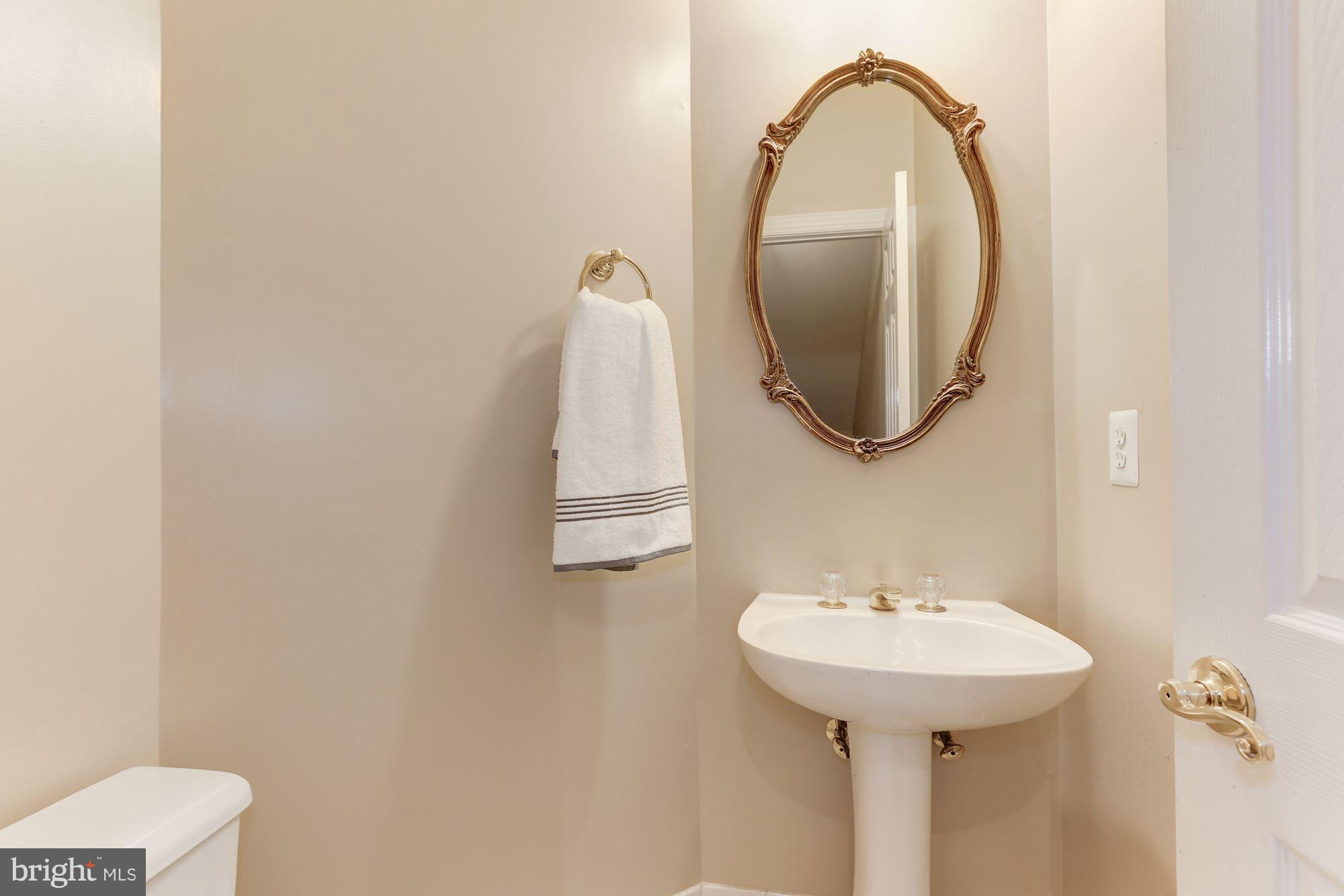 47692 Woolcott Square Sterling, VA 20165 - Photo 15 of 30 Main level half bath