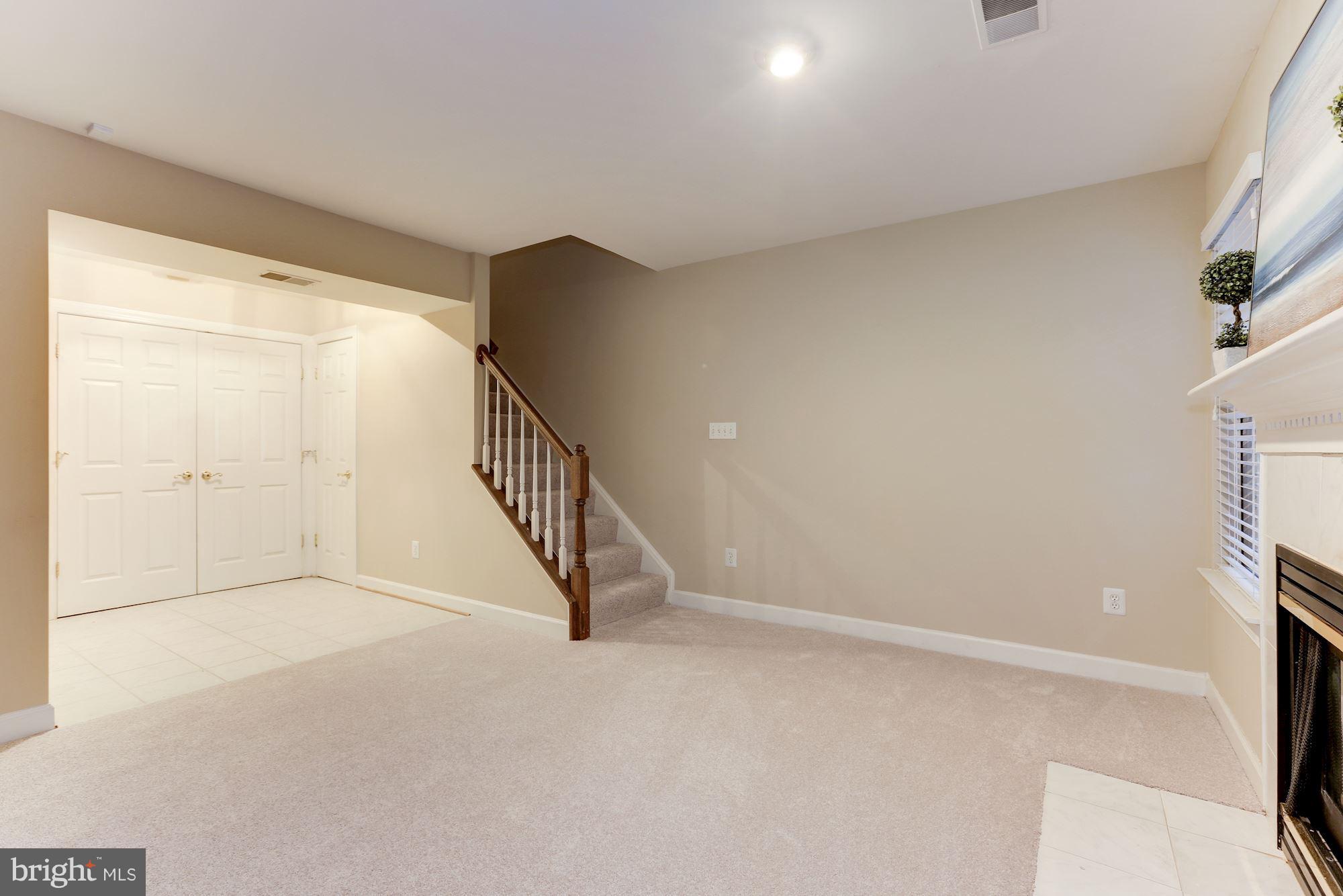 47692 Woolcott Square Sterling, VA 20165 - Photo 26 of 30 Basement with new carpet throughout