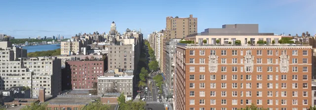 a view of a city with tall buildings