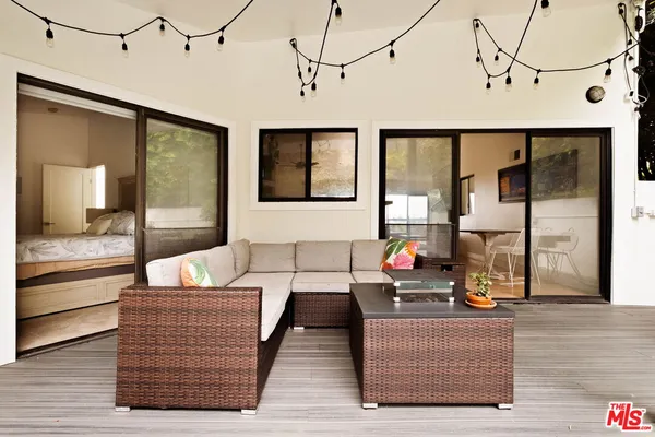 a bedroom with a bed furniture and a window