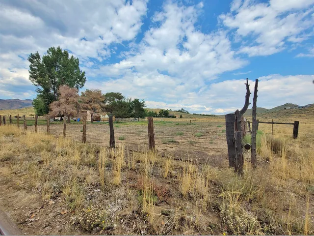 a view of a lake with a big yard
