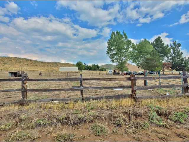 a view of a road with an ocean view