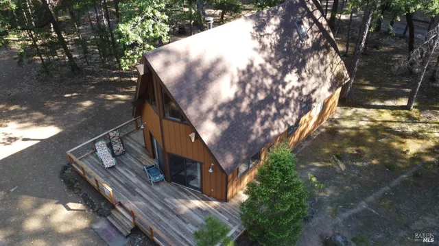 a view of balcony with wooden floor