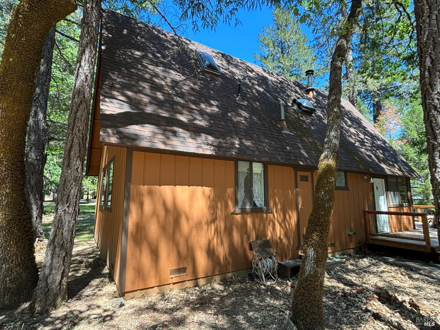 30518 Rodeo Road Potter Valley, CA 95469 - Photo 2 of 35 a view of a house with a tree