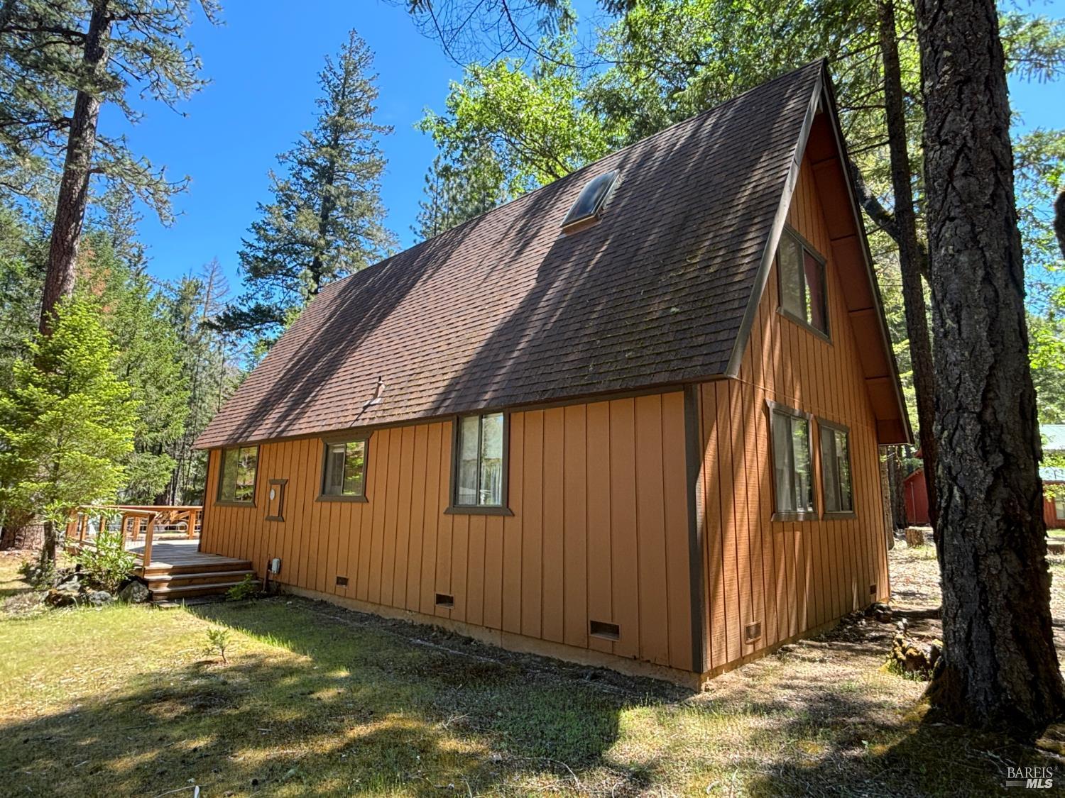 30518 Rodeo Road Potter Valley, CA 95469 - Photo 3 of 35 a backyard of a house with yard and outdoor seating