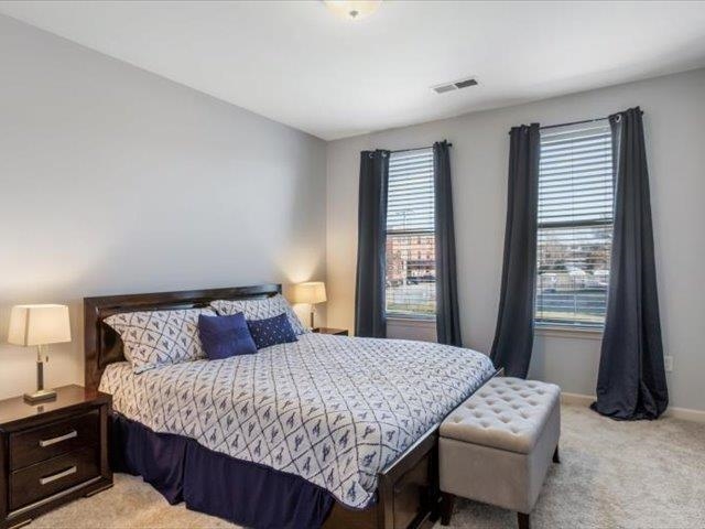 580 South Main Street, Unit 204 Memphis, TN 38103 - Photo 18 of 28 Bedroom with light colored carpet