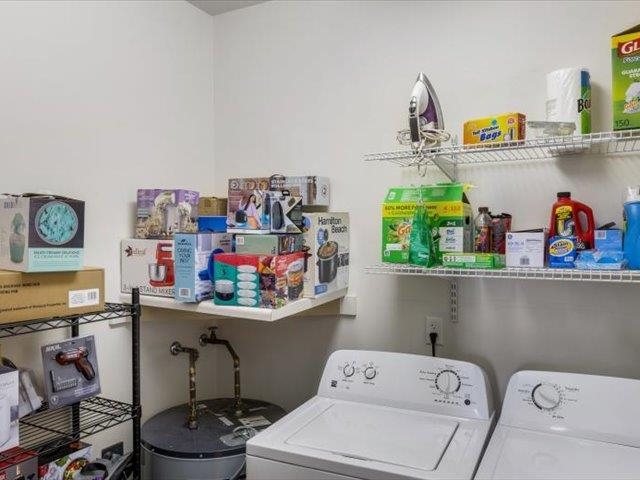 580 South Main Street, Unit 204 Memphis, TN 38103 - Photo 22 of 28 Laundry room featuring washing machine and clothes dryer