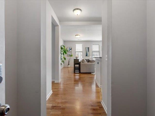 580 South Main Street, Unit 204 Memphis, TN 38103 - Photo 6 of 28 Hallway with light wood finished floors and baseboards